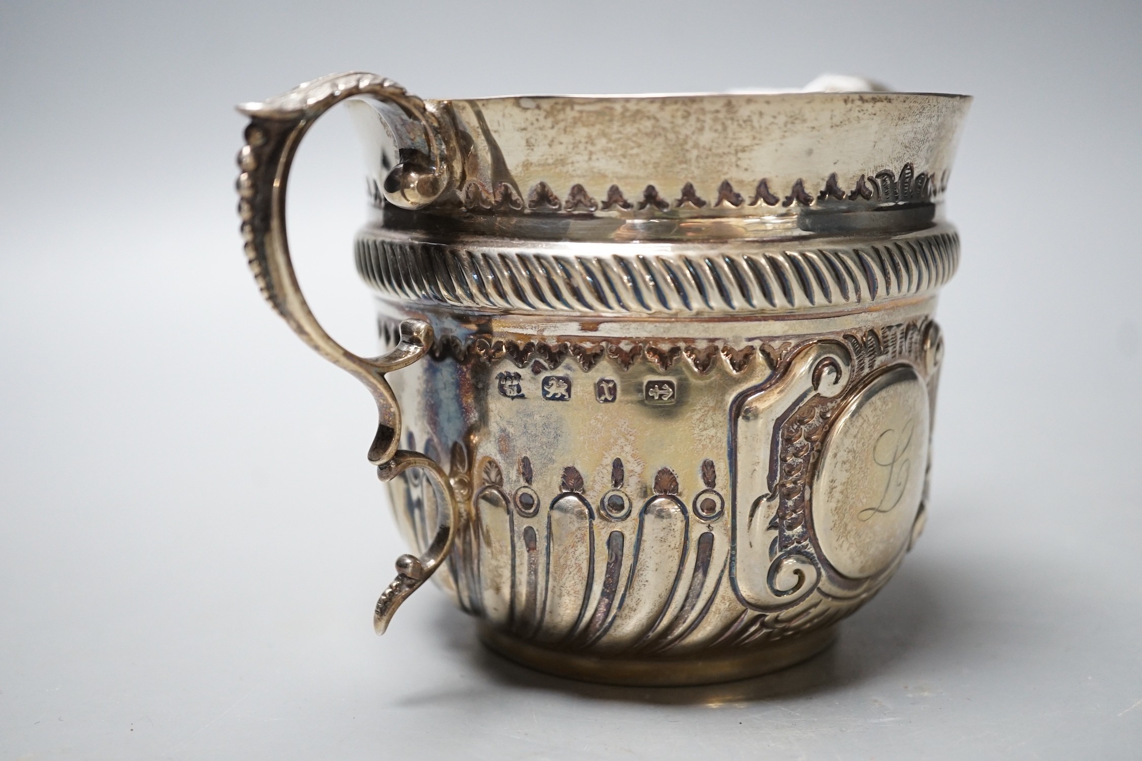 A late Victorian demi fluted silver porringer, by D & M Davis, Birmingham, 1897, height 92mm, 7oz.